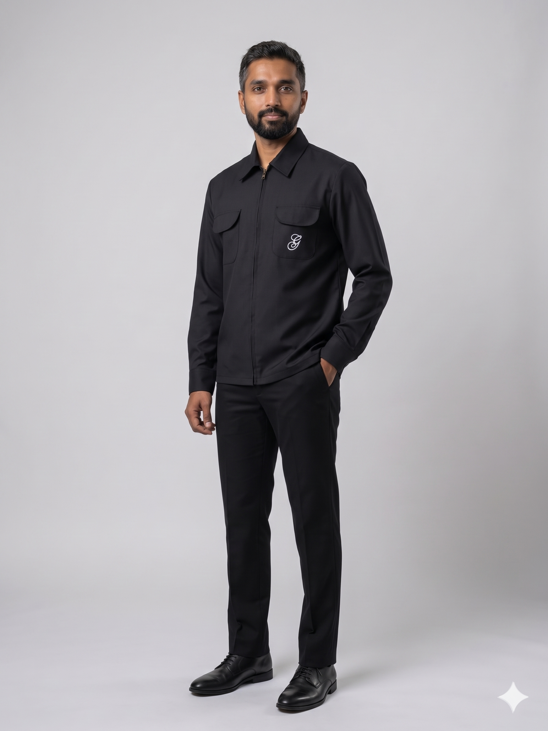 Black utility shirt with embroidered monogram